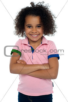 African girl with a cute smile posing casually
