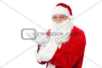 Happy Santa Claus smiling with open palms