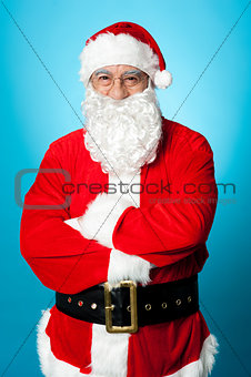 Confident aged male in Santa costume