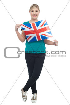 Cute blonde UK supporter striking stylish pose