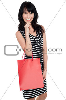 Portrait of a young shopaholic woman