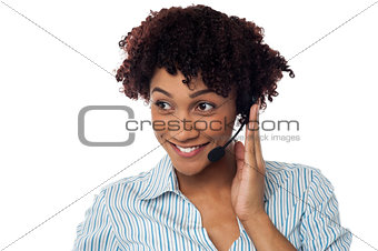 Casual shot of a call centre executive looking away