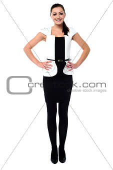 Stylish young female with hands on waist
