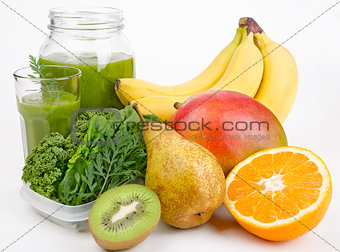 Green Smoothie With Leafs And Fruits