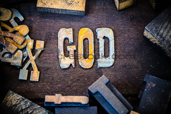 God Concept Wood and Rusted Metal Letters