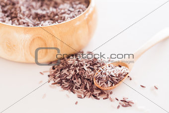 Berry rice in wooden bowl