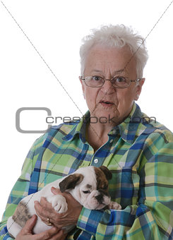 senior woman and puppy