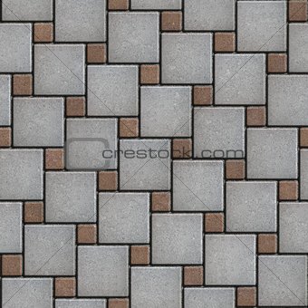 Gray-Brown Paving Slabs Laid Alternately Large and Small Squares.