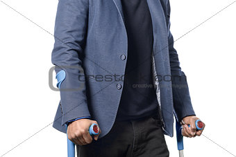 Disabled african man Walking with Two Crutches
