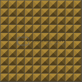 wall with ochre yellow pyramid tiles pattern