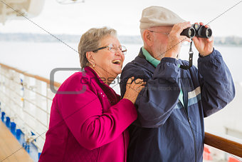 Senior Couple Enjoying The Deck of a Cruise Ship