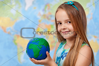 The world in my hands - little girl in geography class