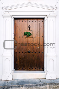 Brown door with christmas decoration