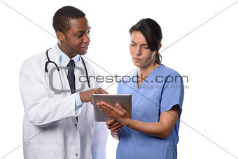 Two medical colleagues consulting a tablet-pc