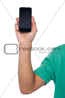 Cropped image of a guy displaying mobile handset