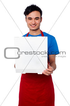 Guy delivering pizza at your door step