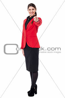 Elegant presentable businesswoman pointing