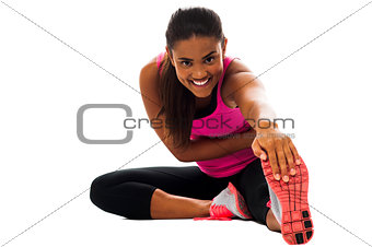 Fitness girl doing stretching exercise