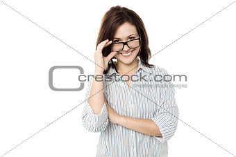 Cute woman adjusting her eyewear