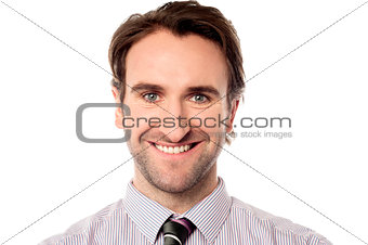 Smiling businessman looking at you