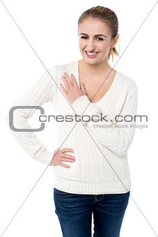 Attractive girl resting arm across her chest