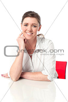 Calm corporate woman relaxing in office