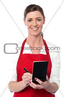 Attractive waitress taking order