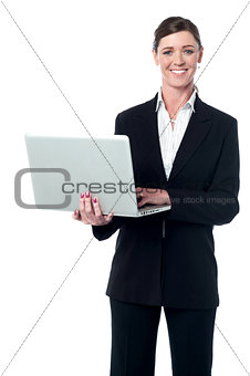 Middle aged professional woman with laptop