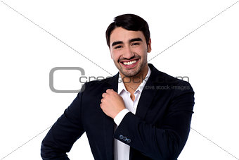 Good looking casual smiling young businessman