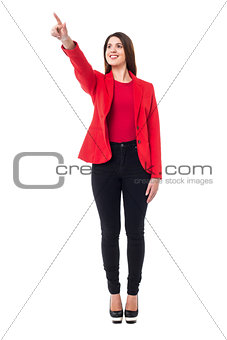Confident corporate lady pointing at something