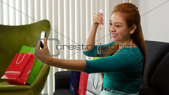 Latina Girl With Shopping Bags Taking Selfie With Phone