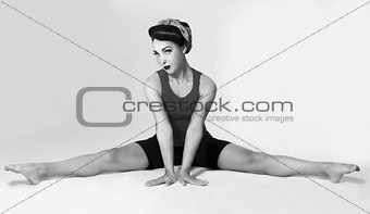 woman sitting on the splits