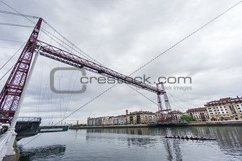 Ultra Wide view closeup of the Bizkaia suspension bridge and boat
