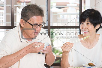 Asian Senior Couple Eating
