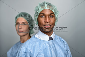 Confident Medical Professionals in surgery gown