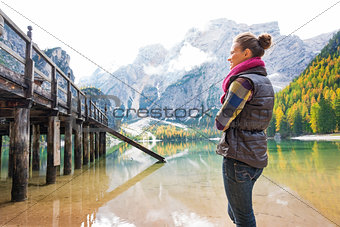 Woman at Lake Bries standing looking at wooden pier