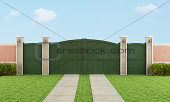 Garden with large driveway gate