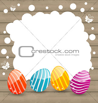 Holiday card with Easter colorful eggs on wooden background