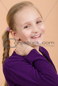 Fashion smiley european little girl posing