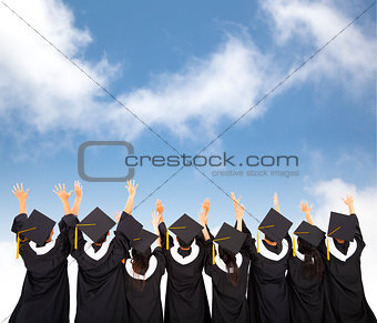 rear view Of  Students Celebrating Graduation