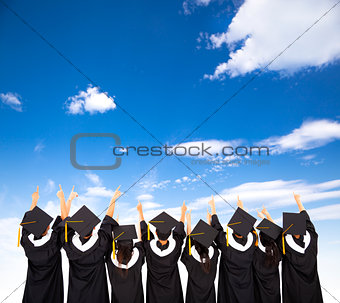 rear view Of  Students Celebrating Graduation 