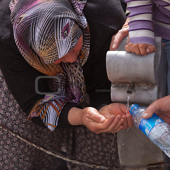 Turkish Woman Collects Water