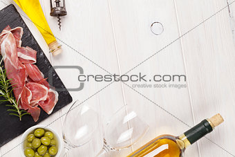 Prosciutto, wine, olives and olive oil