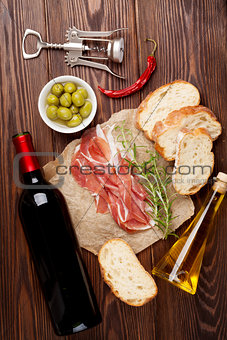 Prosciutto, wine, olives, parmesan and olive oil