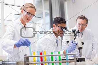 Concentrated scientists working together