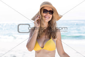 Smiling pretty blonde wearing sun glasses