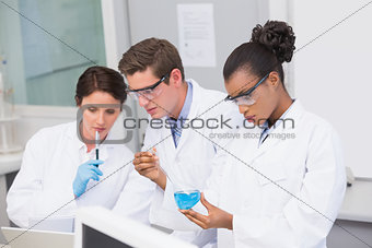 Concentrated scientists working together