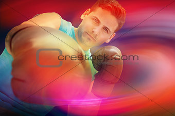 Composite image of serious boxer