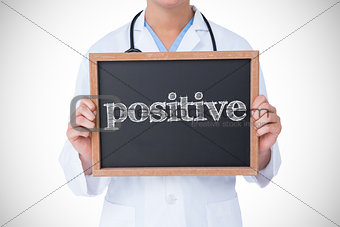 Positive against doctor showing little blackboard
