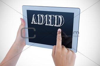 Adhd against woman using tablet pc
